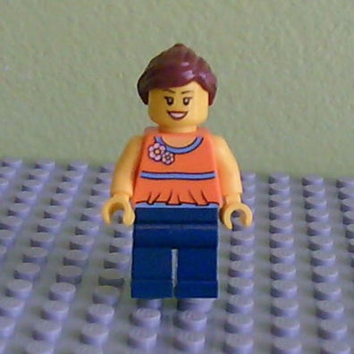 LEGO Minifigure-Orange Halter Top with Medium Blue Trim and Flowers Pattern, Dark Blue Legs, Reddish Brown Ponytail and Swept Sideways Fringe-Town-TWN185-Creative Brick Builders
